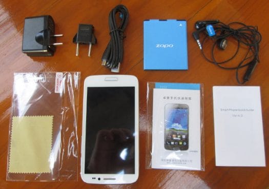 Mediatek MTK6577 Smartphone with power adapter, cables and battery