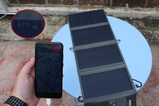 Foldable Solar Charger Charging Smartphone