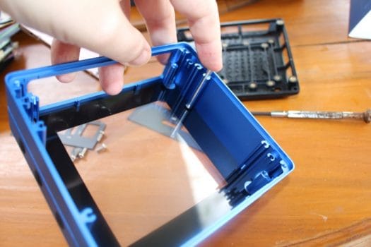 remove magnetically attached acrylic cover